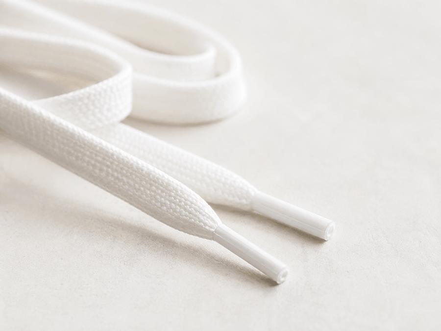 Plastic end of a shoelace called an aglet